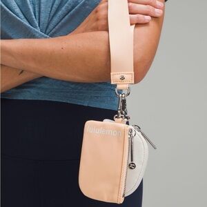 NWT/ Lululemon dual pouch wristlet/ Peach Bellini and White Opal/ One Size